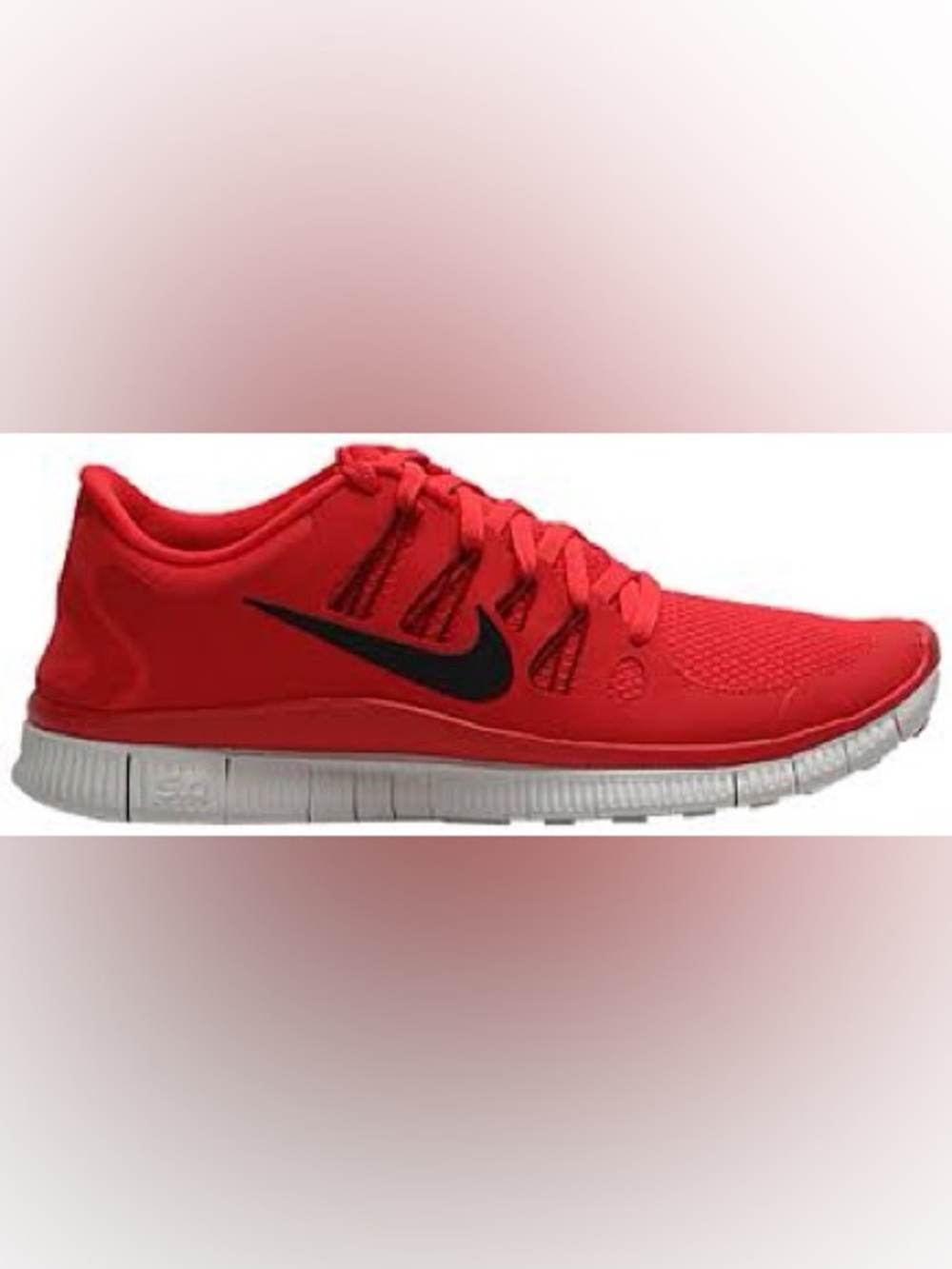 Nike Free 5.0 women's running shoes, featuring a vibrant pink and white size 6